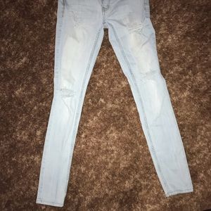 Skinny, distressed jeans